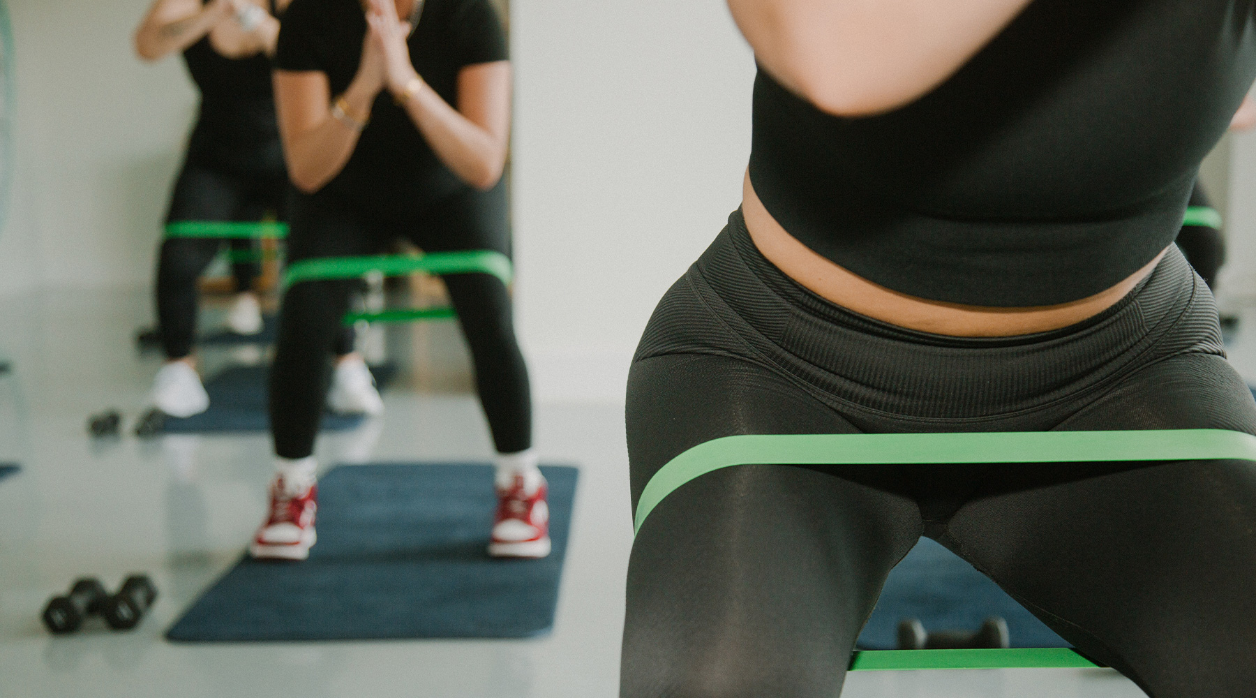 People doing leg exercises at Tandem Movement