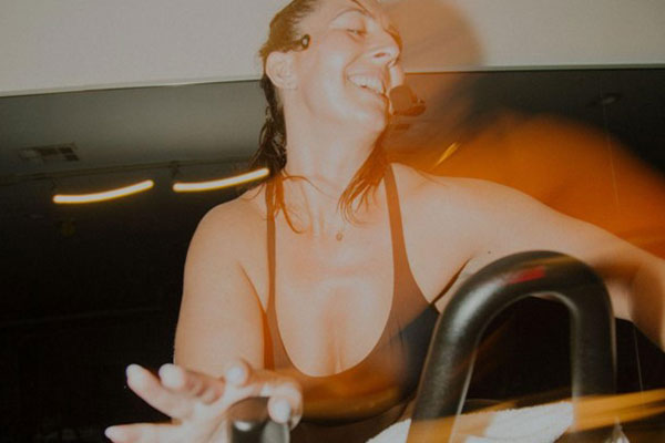 Tandem Movement vibe - woman working out